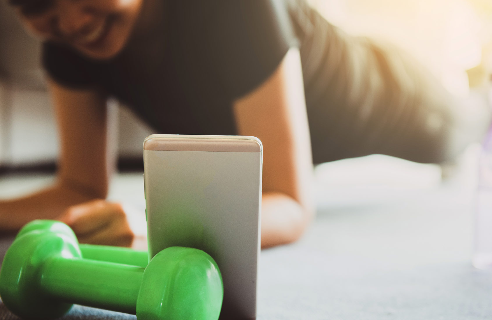 Girl holding a plank